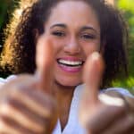 Outdoor Portrait of beautiful young woman posing with expression