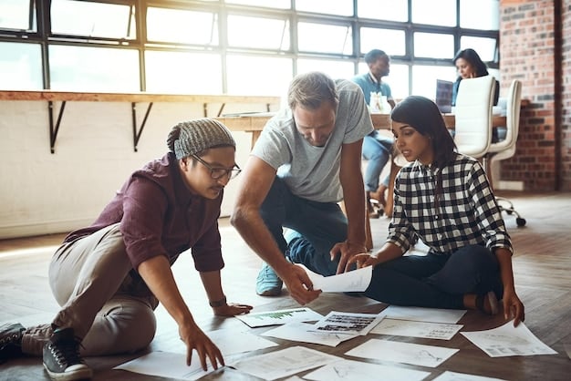A diverse group of people working together in a co-working space, with construction plans visible in the background and tablets displaying financial growth charts, symbolizing collaborative investment in community development.