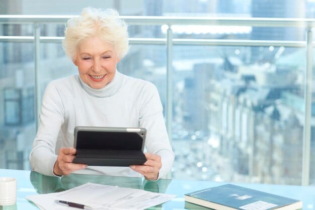 A part-time worker smiling while checking her retirement account balance on a tablet, illustrating the positive impact of the SECURE Act 2.0 on her financial future.
