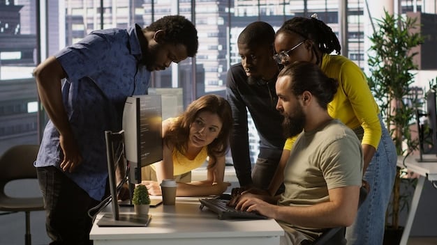 A photograph of a diverse group of employees collaborating on a tech project in a modern, open-plan office, symbolizing the success of inclusive hiring and training programs.