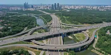 Modern highway interchange with multiple bridges symbolizing infrastructure progress