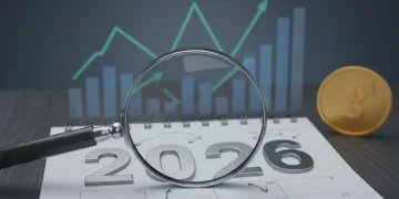 Calendar highlighting 2026 with a magnifying glass, overseeing economic graphs and a coin, representing disability benefit adjustments.